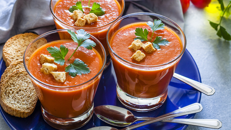 gazpacho in glasses with garnishes