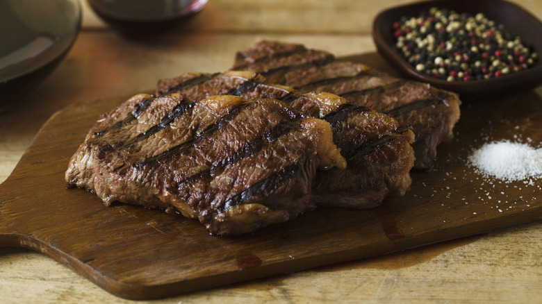 Steak resting on a cutting board