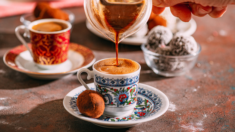 Turkish coffee poured in decorative cup