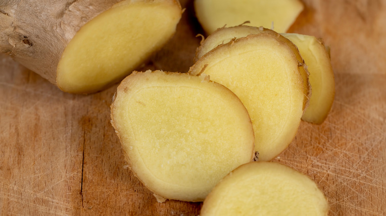 Ginger slices on a cutting board