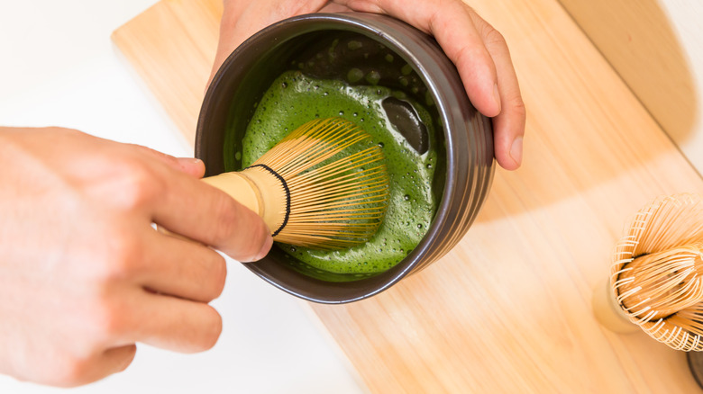 Whisking matcha