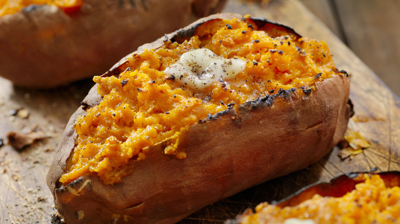 baked sweet potato garnished with butter
