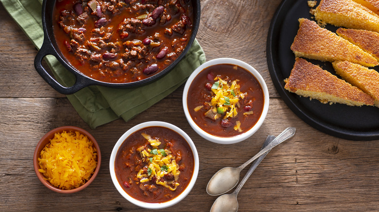 bowls of chili with fixings