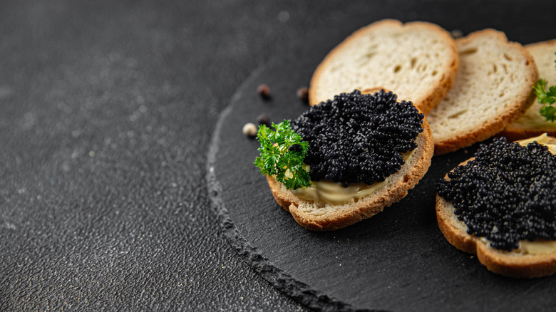 lumpfish caviar over slices of bread