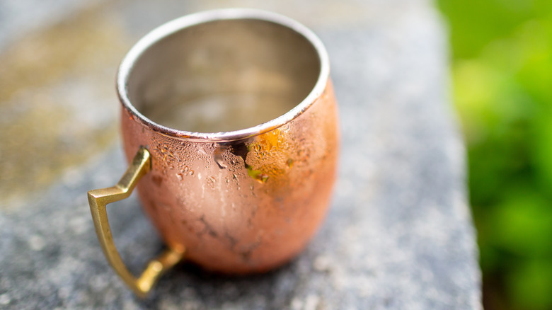 single copper mug with condensation