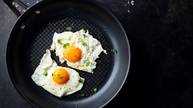 fried eggs in non stick pan