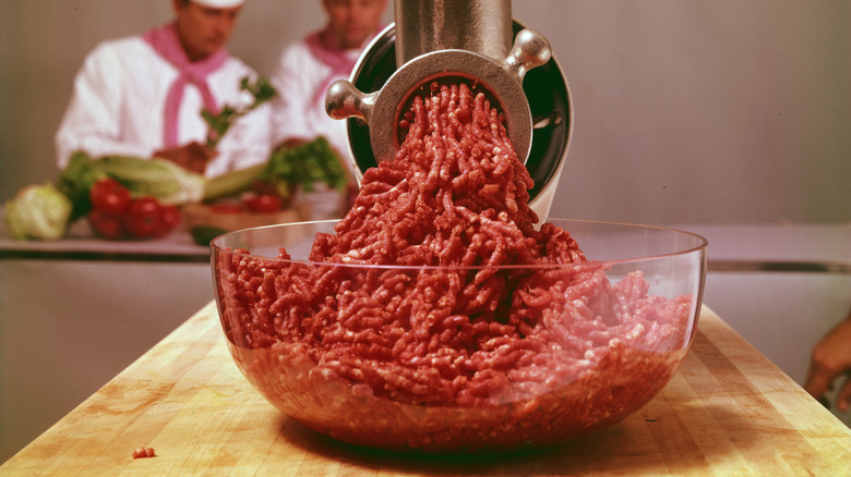 beef coming out of meat grinder