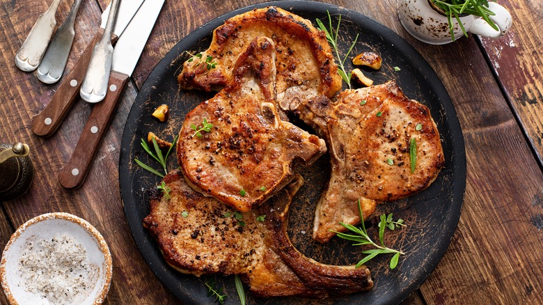 Pan fried pock chops on plate