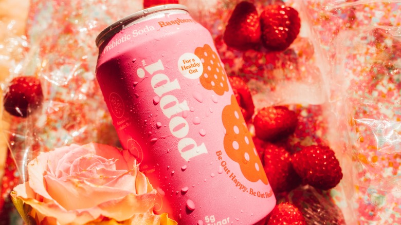 Raspberry Poppi brand prebiotic soda with raspberries