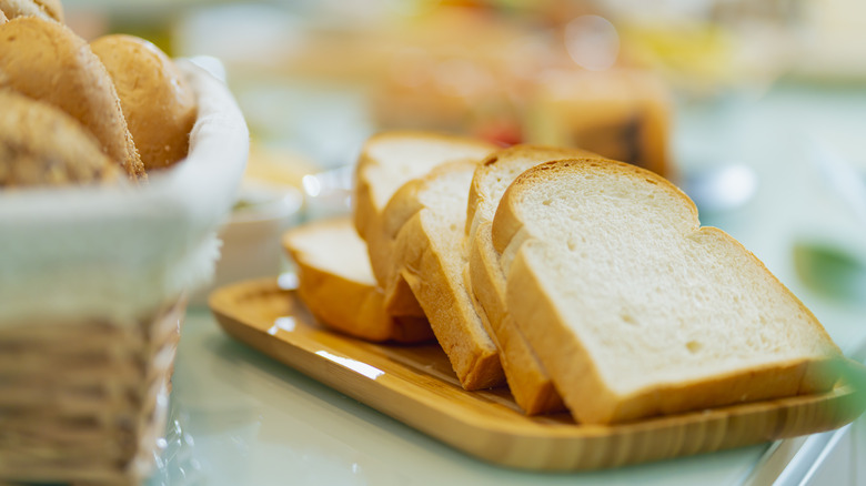 Sliced bread on cutting board