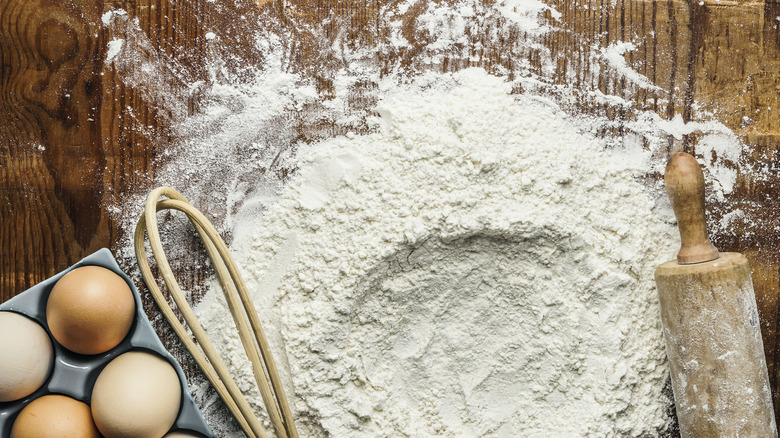 Flour, eggs, and baking tools