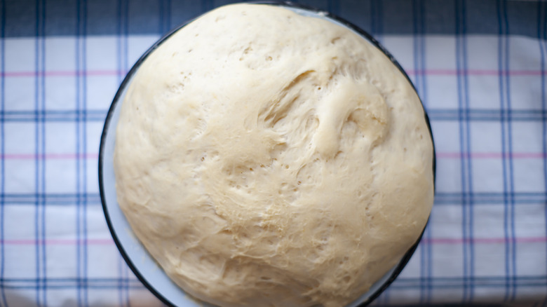 Dough rising in a bowl