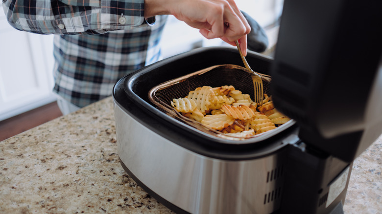 Fries in air fryer basket