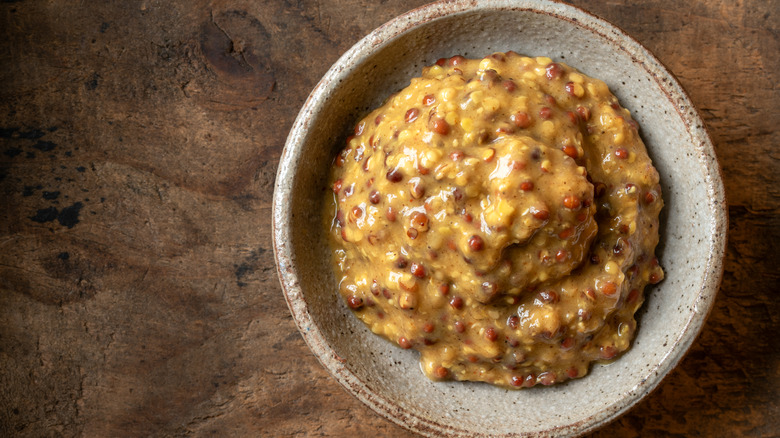 bowl of ground mustard sauce