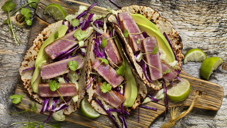 Sliced tuna that has been seared to a mauve rare doneness.