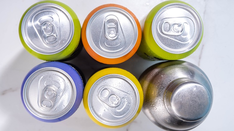 Chilled canned cocktails and shaker aerial view