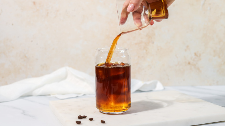 Pouring an iced coffee