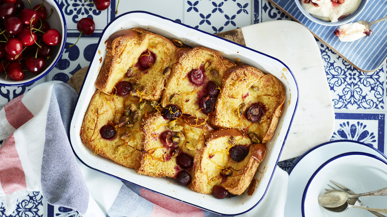 cherry bread pudding in a casserole dish