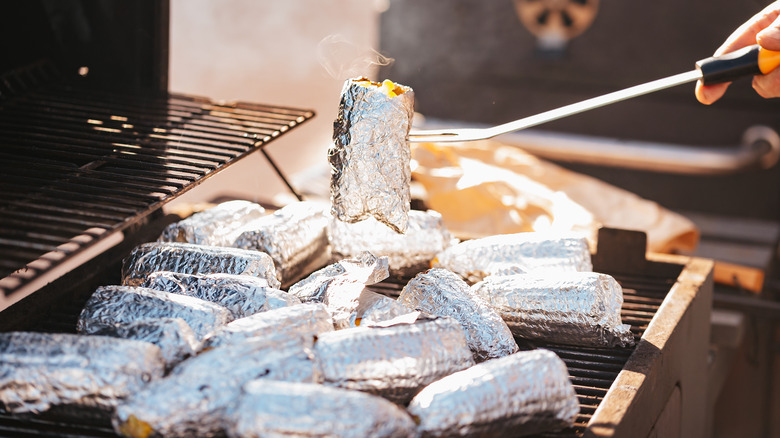 Grilled corn covered in foil