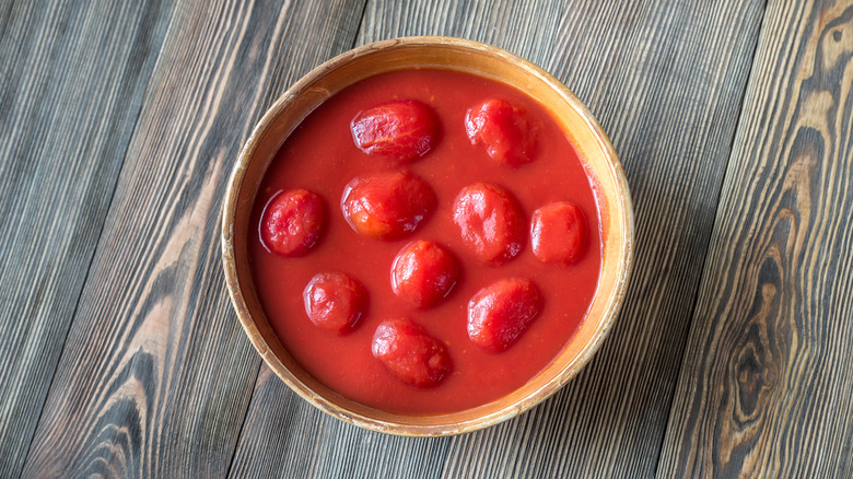 Bowl of whole canned tomatoes