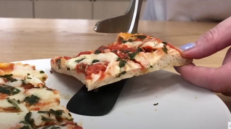 Cutting pizza with shears