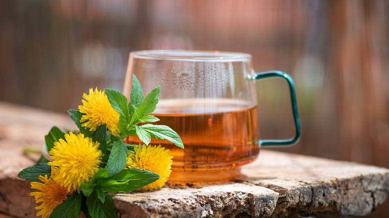 Glass mug of dandelion tea