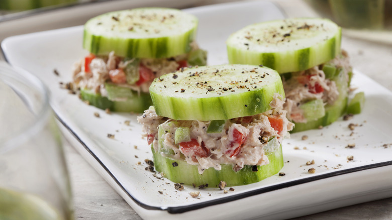Cucumber canape with tuna salad and cracked pepper