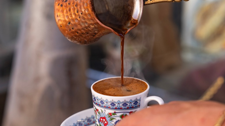 Pouring traditional Turkish coffee