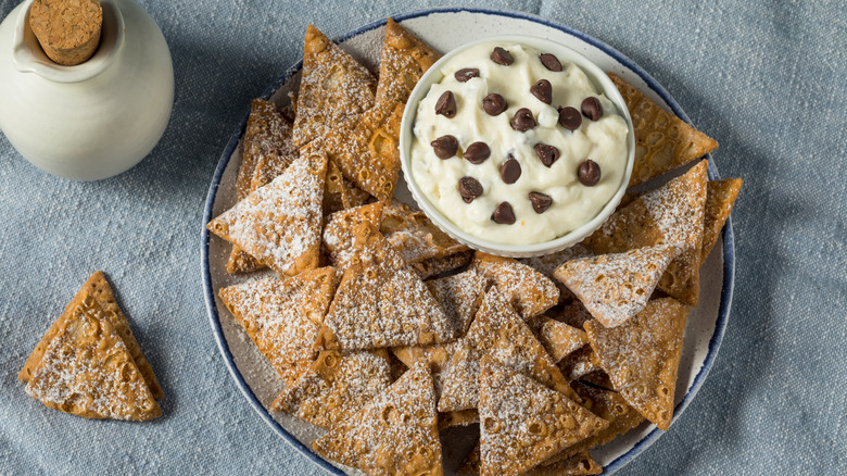 Cannoli dip with dipping chips on a plate