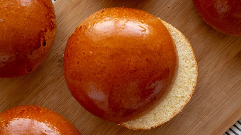 Brioche hamburger buns on table