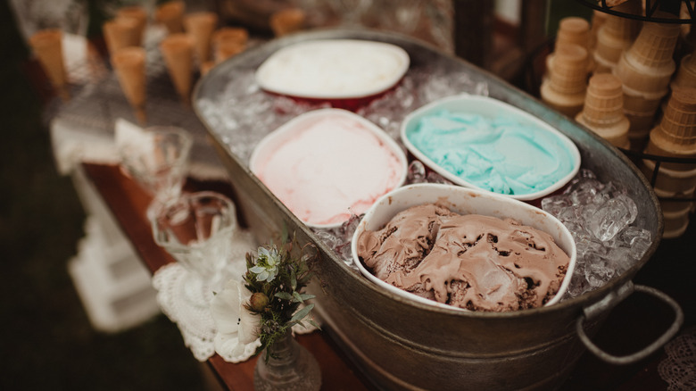 Tubs of ice cream in ice