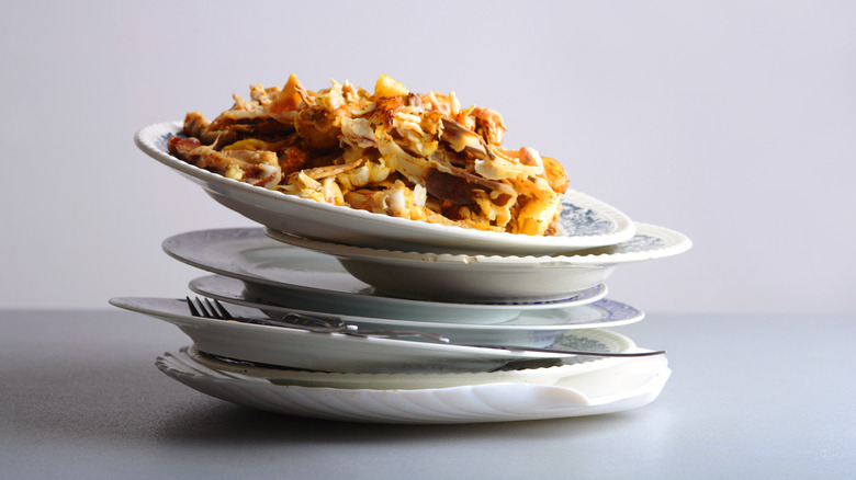 stack of plates with food