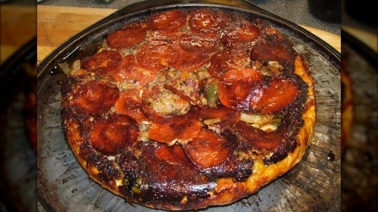 Upside down skillet pizza with delicious charred edges.