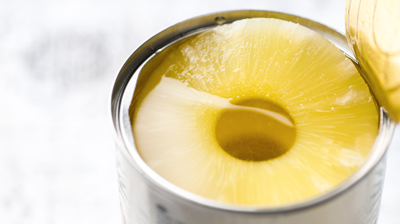 Open can of sliced pineapple