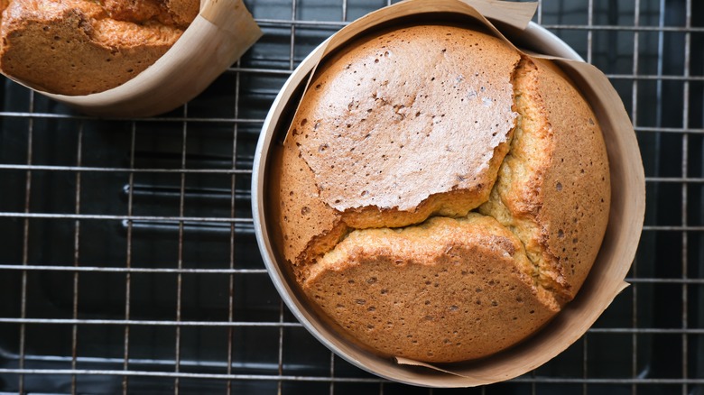 A cake with cracks in it seen from above.