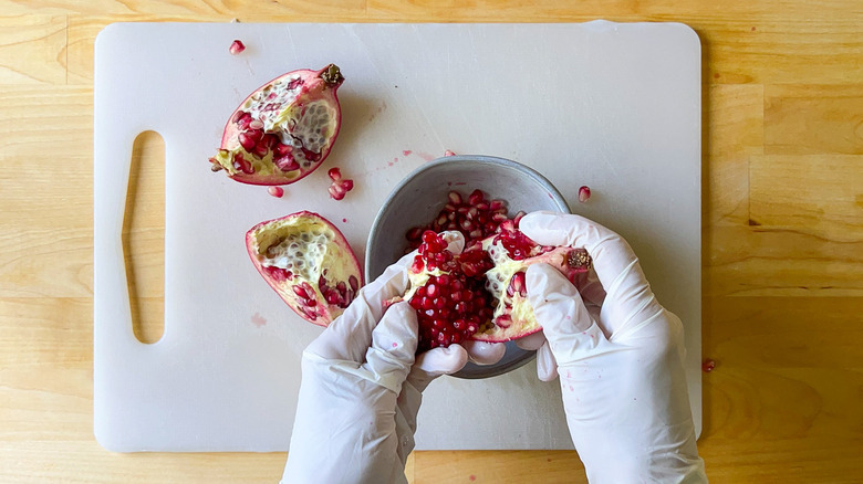 Removing seeds from pomegranate