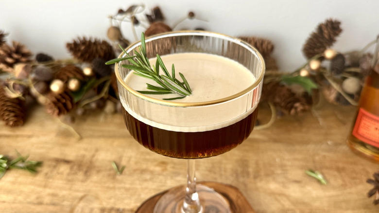 Espresso martini with rosemary garnish