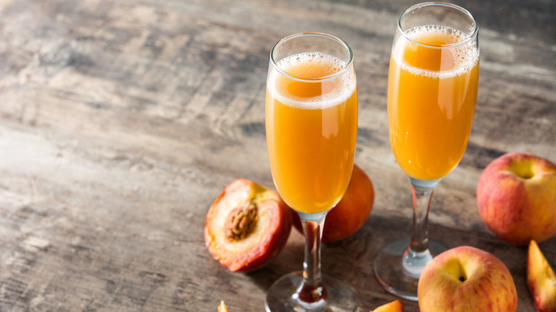 Bellinis in champagne glasses
