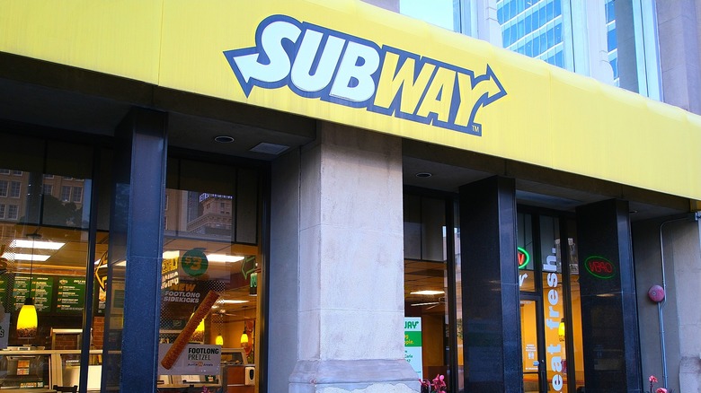 exterior of a Subway sandwich shop in an urban area at daytime