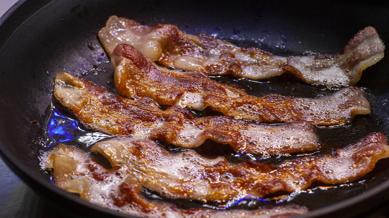 Bacon cooking in pan