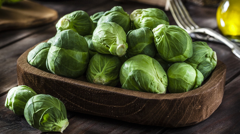brussels sprouts in wooden bowl