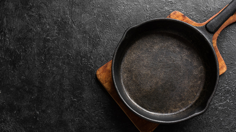 Cast iron skillet on a cutting board