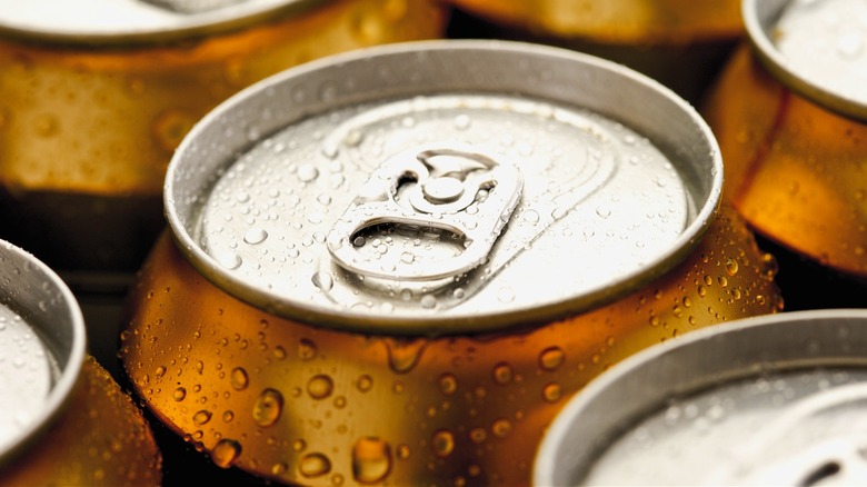 Cold beer cans close-up