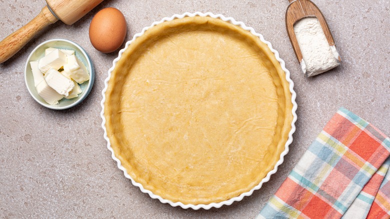 unbaked pie crust in pan