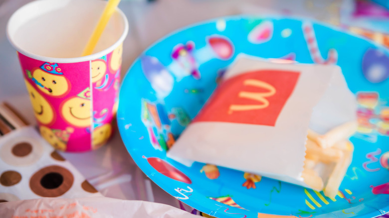 Festive paper products with McDonald's bag