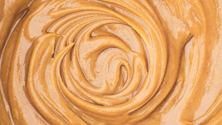 Overhead close-up of creamy peanut butter