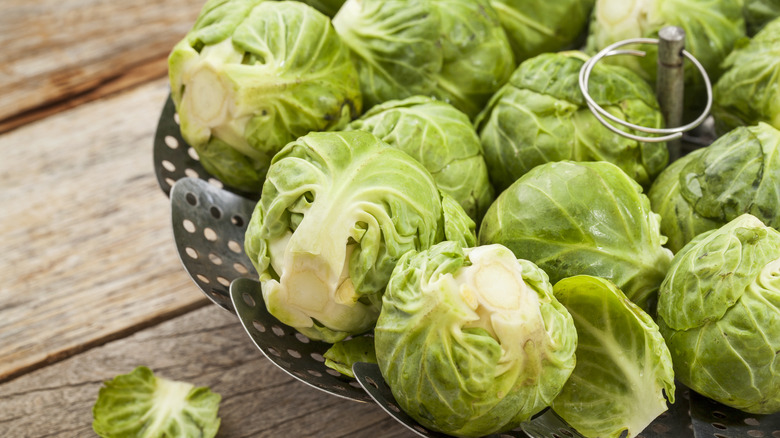 A steamer basket of Brussel sprouts