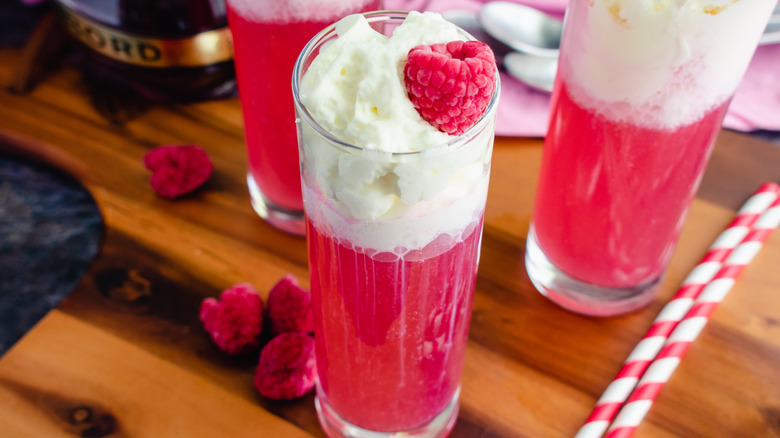 Raspberry Italian cream soda with fresh raspberries