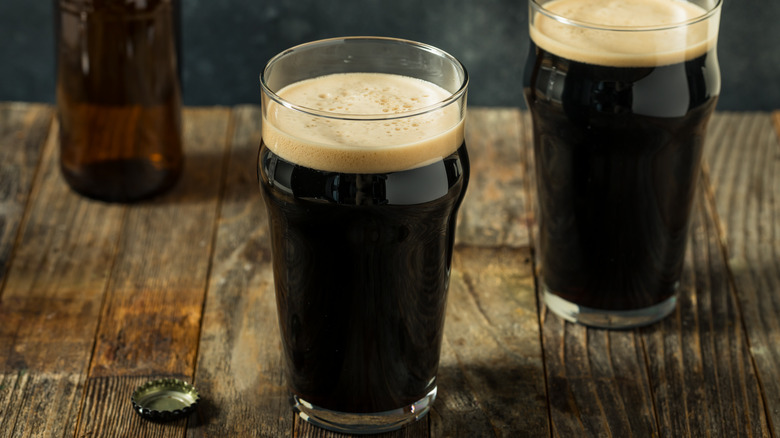 Two Irish stout pints of beer