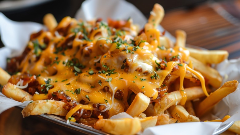 Cheese fries dusted with herbs